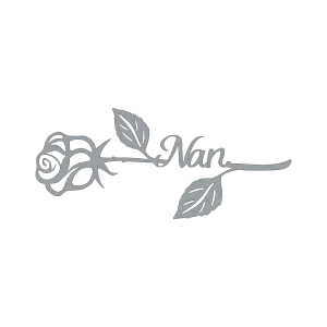 Laser-cut wall art made from raw steel, featuring a rose with detailed petals and two leaves. The word 'Nan' is elegantly connected to the rose's stem, extending to the right. The piece is set against a solid black background.